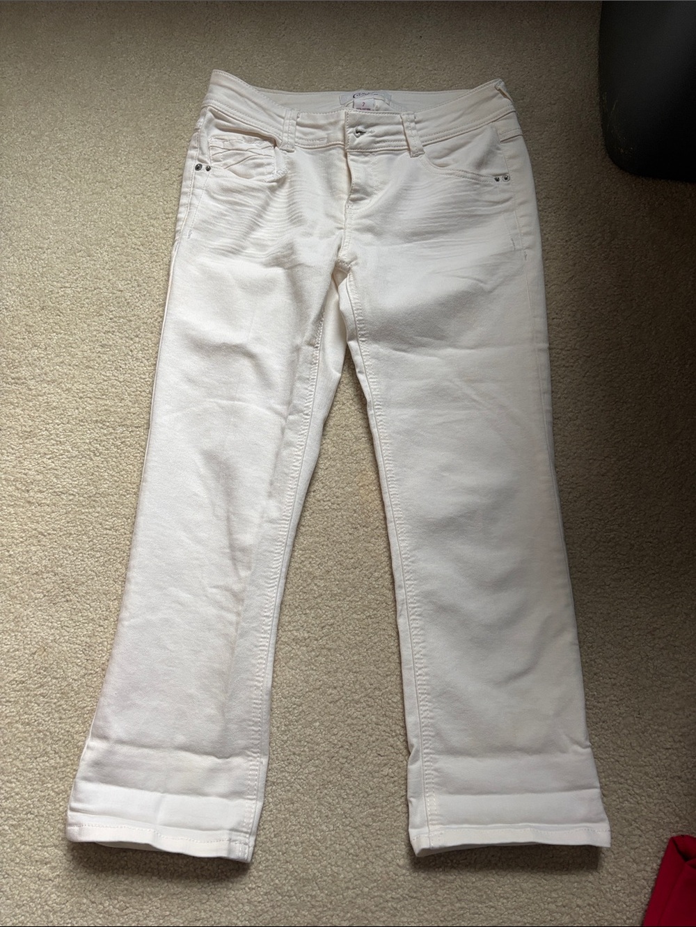 Candie’s white jeans